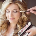Beautiful Bride Girl With Wedding Makeup And Hairstyle. Stylist