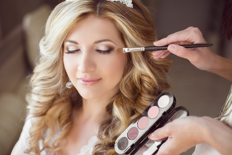 Beautiful Bride Girl With Wedding Makeup And Hairstyle. Stylist